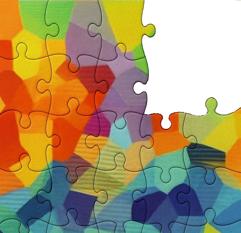 Colorful interlocking puzzle pieces representing project delivery